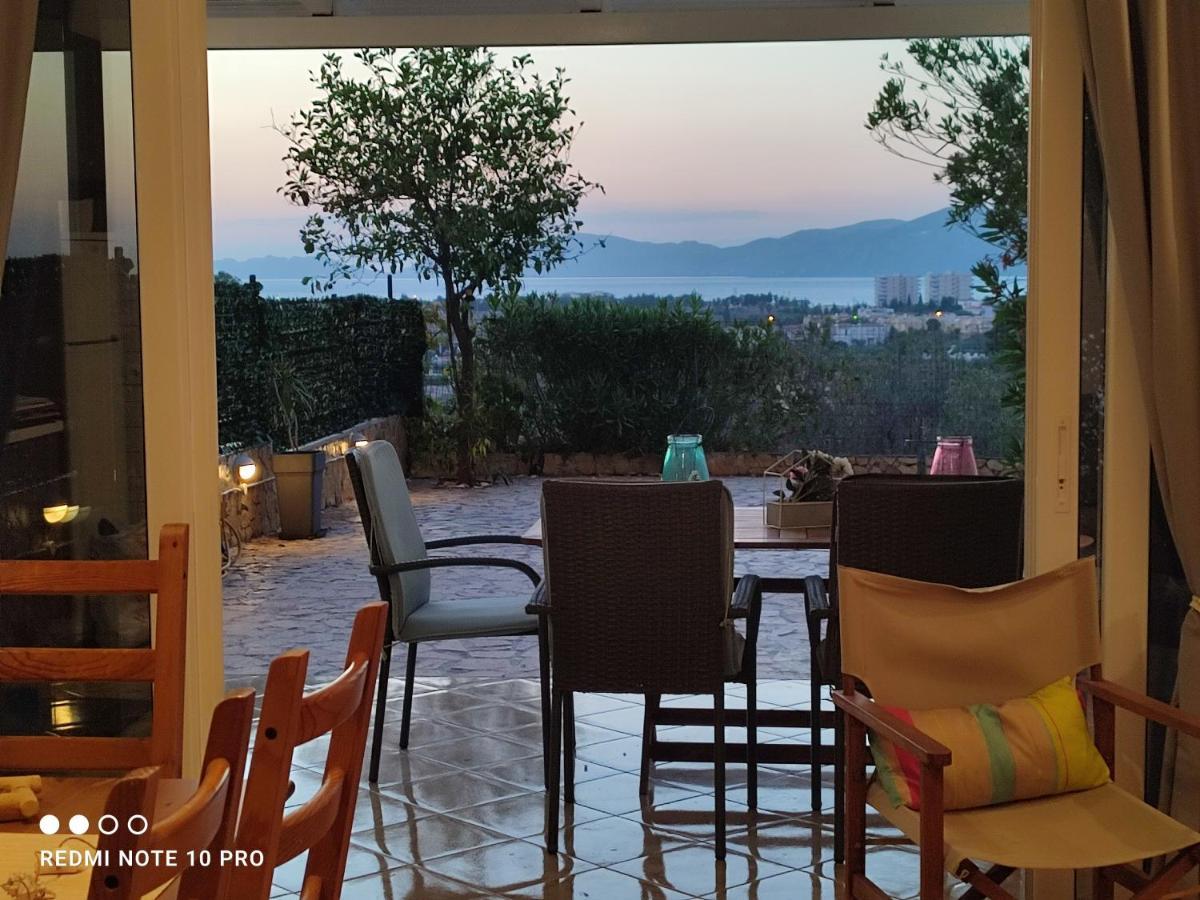 Andrew'S Sunset View Apartment Лутракі Екстер'єр фото