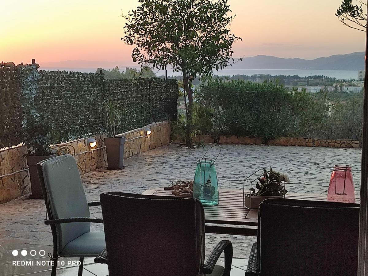 Andrew'S Sunset View Apartment Лутракі Екстер'єр фото