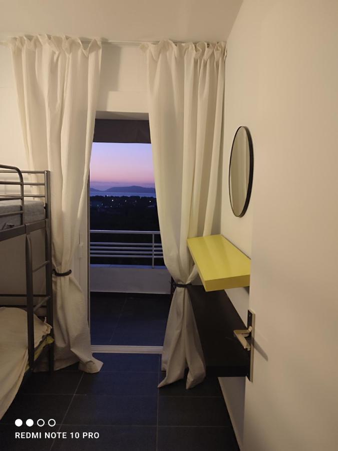 Andrew'S Sunset View Apartment Лутракі Екстер'єр фото